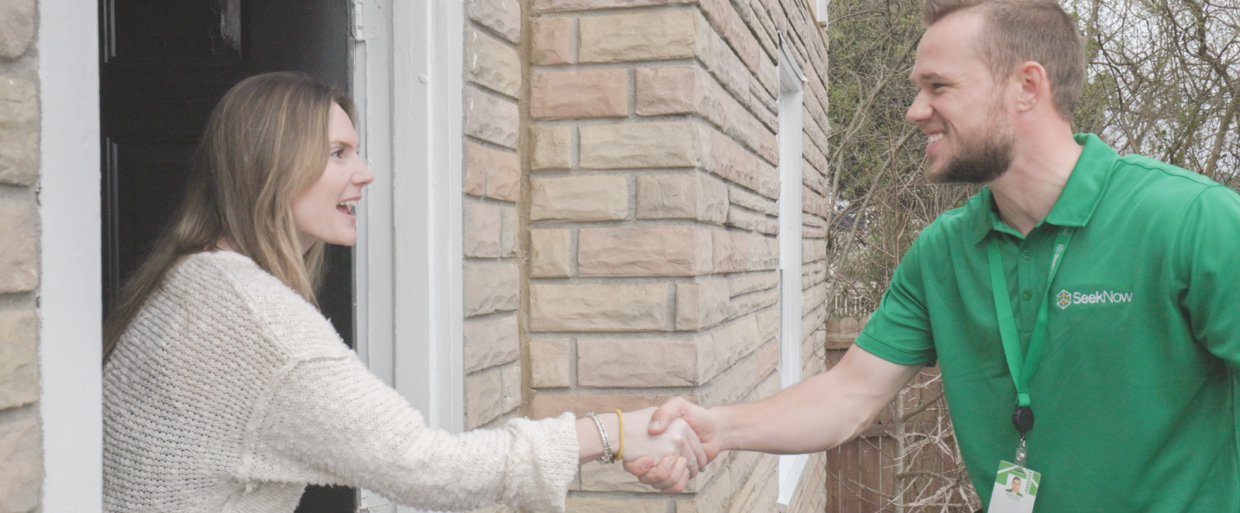 inspector greeting homeowner