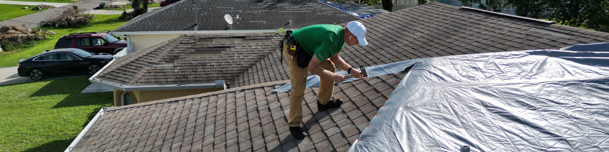 putting a tarp on roof