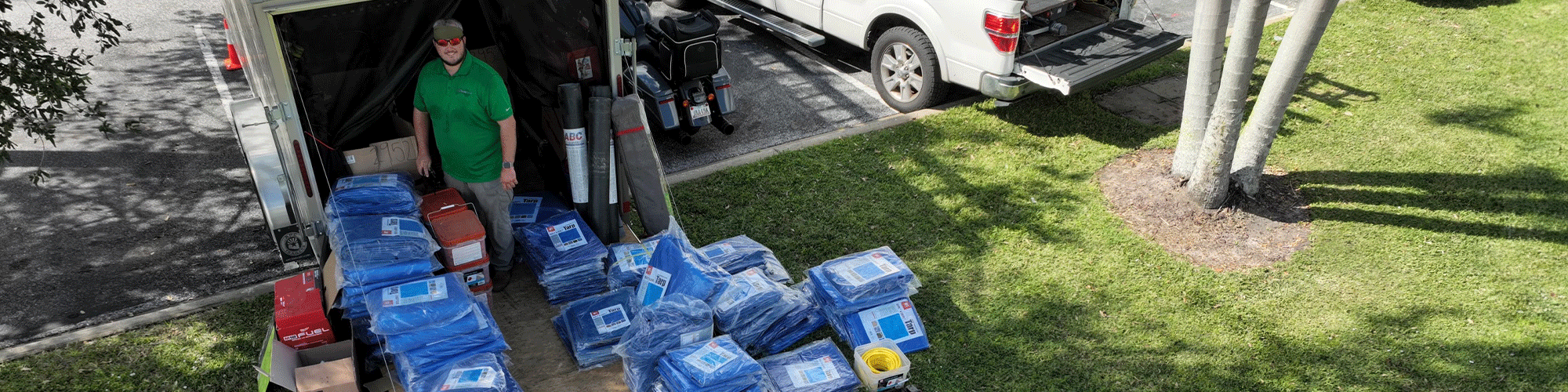 Loading up emergency trailer with tarps